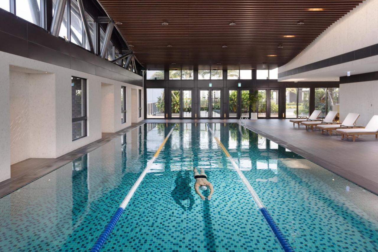 Crowne Plaza Tainan By Ihg Hotell Eksteriør bilde The pool at the 2012 Commonwealth Games Athletes' Village